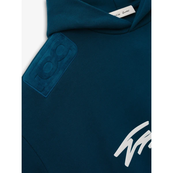 Fear of God Essentials Classic Half Raglan Hoodie in Night Sea | Sweatshirts | Coveti