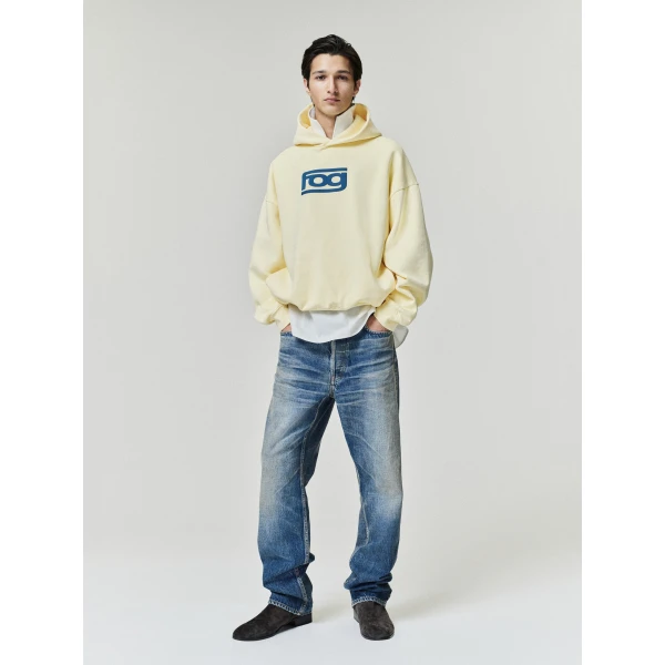 Fear of God Essentials Classic Half Raglan Hoodie in Washed Sulphur | Sweatshirts | Coveti