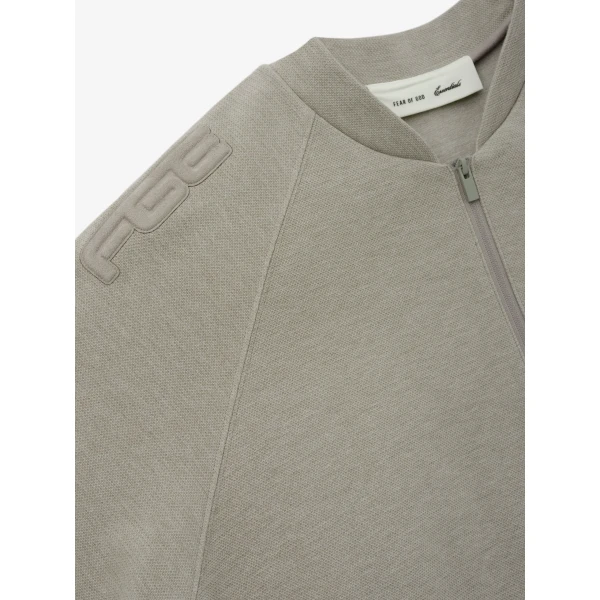 Fear of God Essentials Classic Half Zip Raglan in Pyrite Heather | Sweatshirts | Coveti