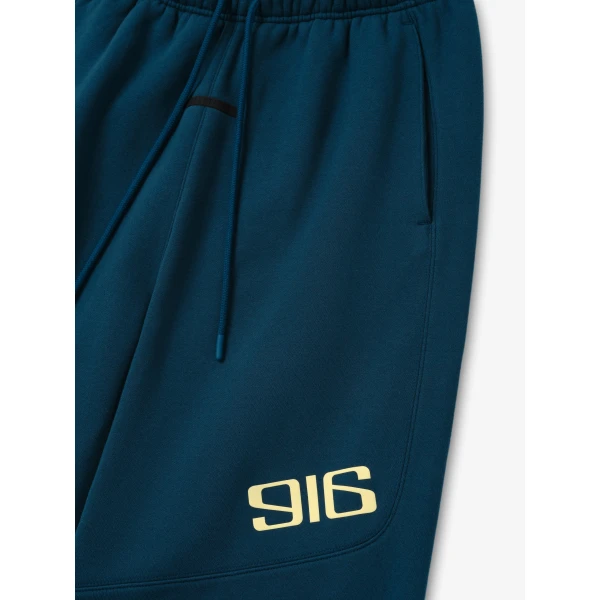 Fear of God Essentials Classic Moto Sweatpant in Night Sea | Pants | Coveti