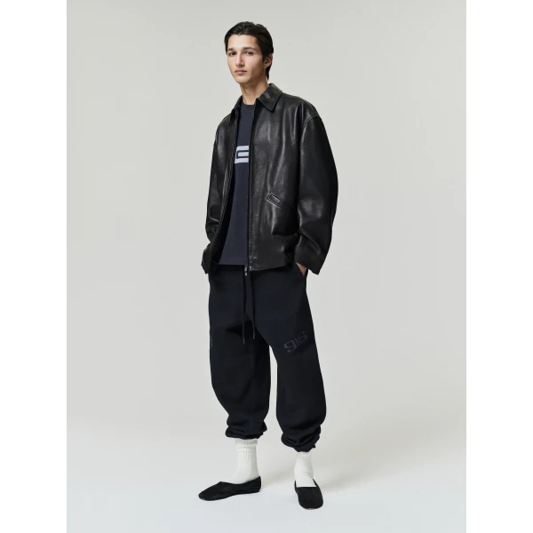 Fear of God Essentials Classic Moto Sweatpant in Vintage Black | Pants | Coveti