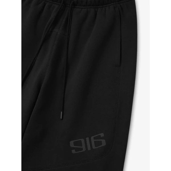 Fear of God Essentials Classic Moto Sweatpant in Vintage Black | Pants | Coveti