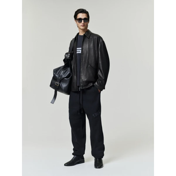 Fear of God Essentials Classic Moto Sweatpant in Vintage Black | Pants | Coveti