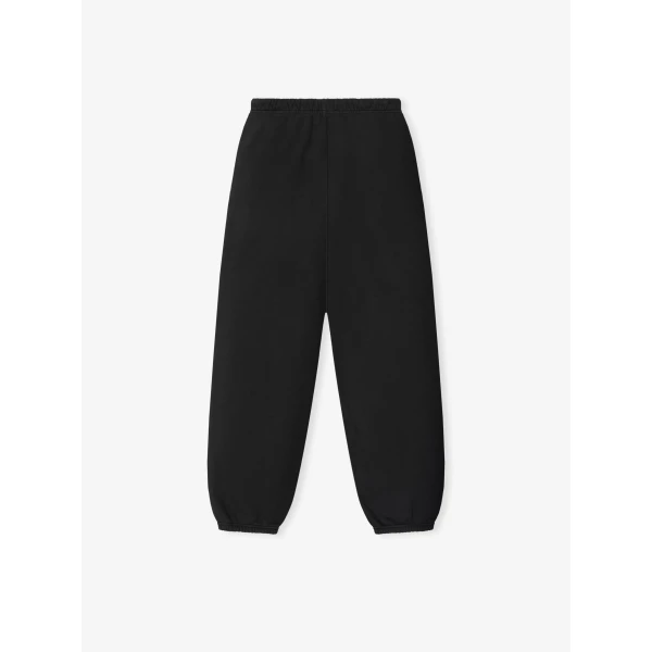 Fear of God Essentials Classic Slouchy Sweatpant in Washed Vintage Black | Pants | Coveti