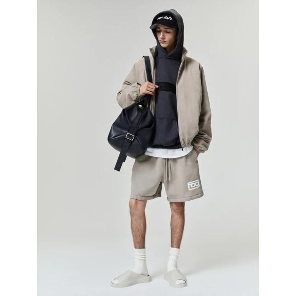Fear of God Essentials Cotton Twill Modern Filled Jacket in Washed Clay | Men Jackets | Coveti