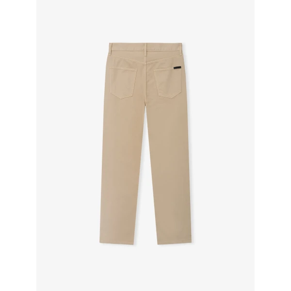 Fear of God Essentials Denim 5-Pocket Jeans in Overdyed Dune | Pants | Coveti
