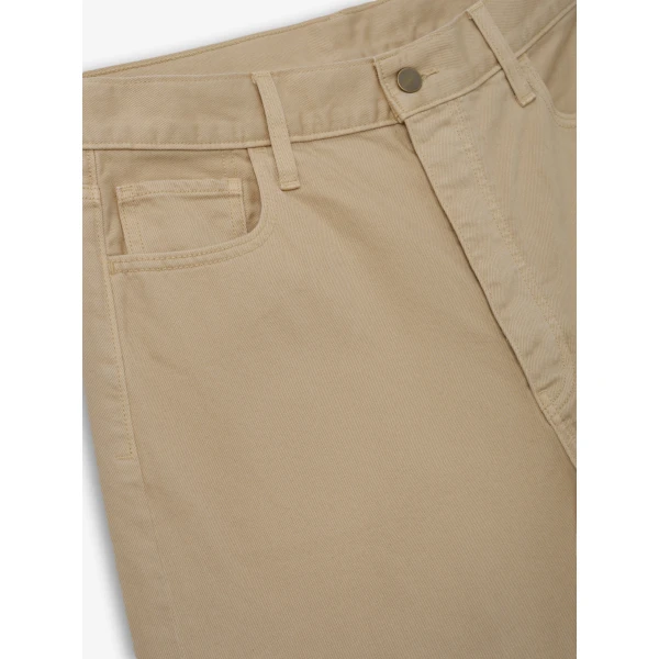 Fear of God Essentials Denim 5-Pocket Jeans in Overdyed Dune | Pants | Coveti