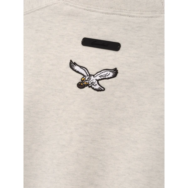 Fear of God Essentials Eagles 90s Relaxed Crewneck in Marble Heather | Sweatshirts | Coveti