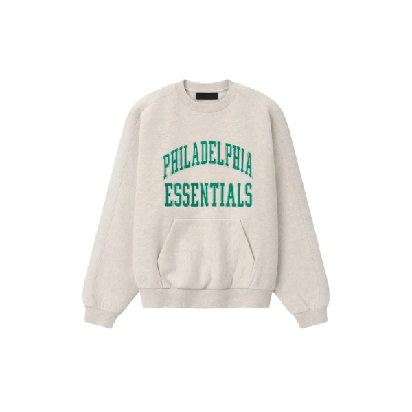 Fear of God Essentials Eagles 90s Relaxed Crewneck in Marble Heather | Coveti