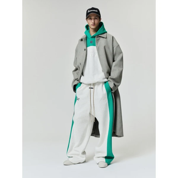 Fear of God Essentials Eagles 90s Relaxed Hoodie in Marble Heather | Sweatshirts | Coveti