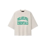 Fear of God Essentials Eagles Merch Tee in Marble Heather | Coveti