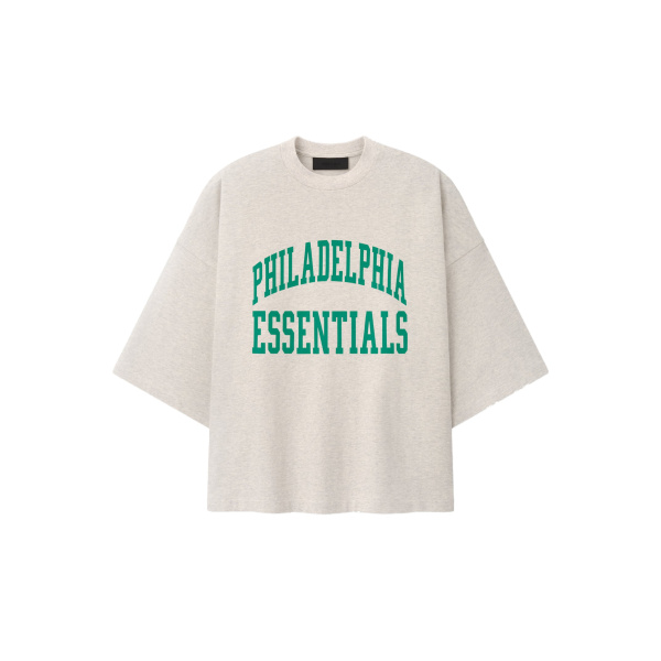 Fear of God Essentials Eagles Merch Tee in Marble Heather | Coveti