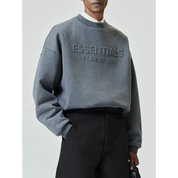 Fear of God Essentials Embossed 90s Relaxed Crewneck in Ash Heather | Sweatshirts | Coveti