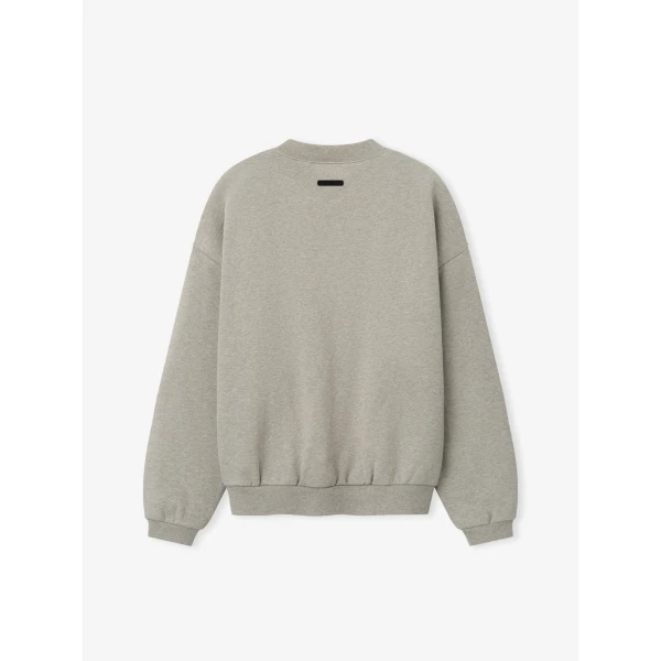 Fear of God Essentials Embossed 90s Relaxed Crewneck in Warm Heather | Sweatshirts | Coveti