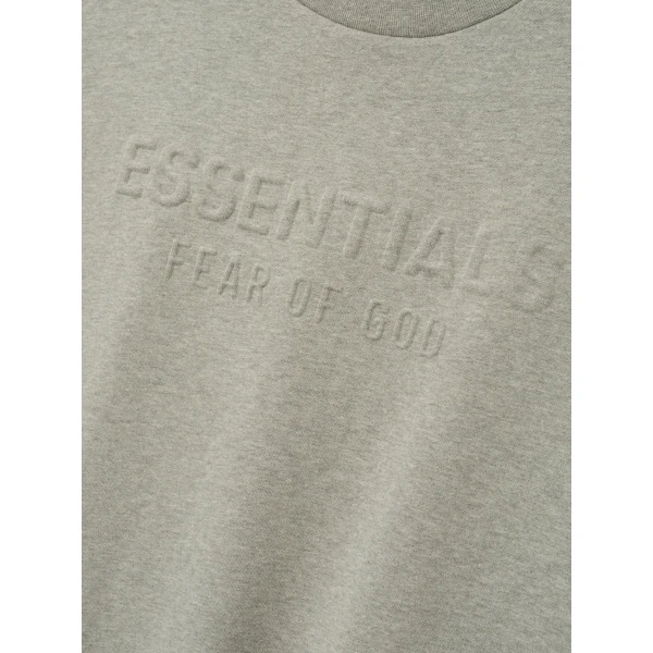 Fear of God Essentials Embossed 90s Relaxed Crewneck in Warm Heather | Sweatshirts | Coveti