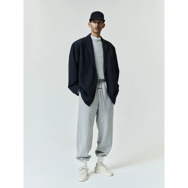 Fear of God Essentials Embossed 90s Relaxed Crewneck in Warm Heather | Sweatshirts | Coveti