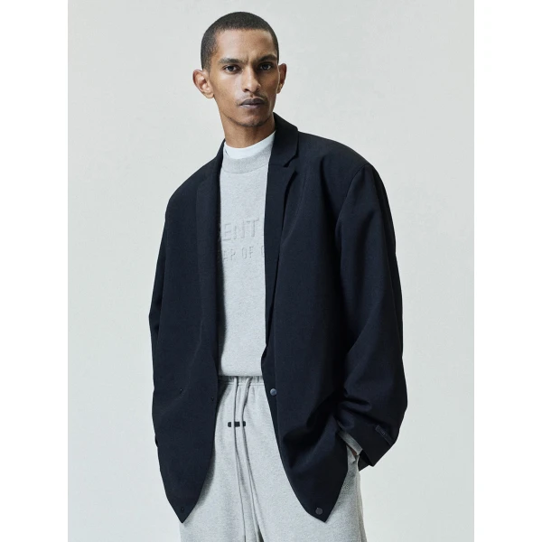 Fear of God Essentials Embossed 90s Relaxed Crewneck in Warm Heather | Sweatshirts | Coveti