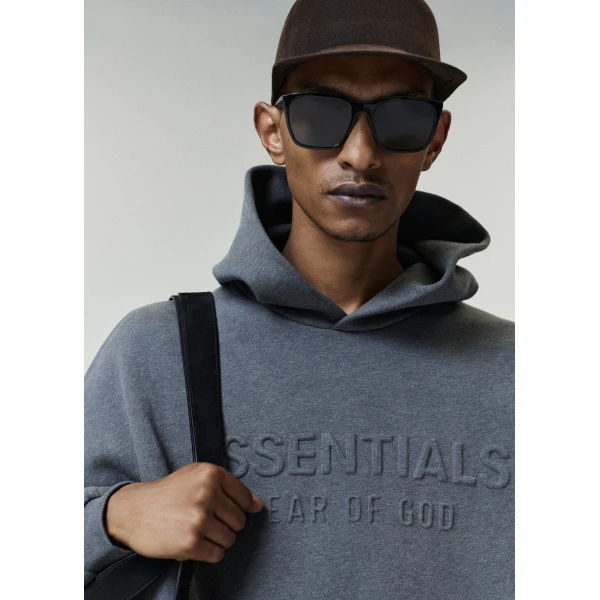 Fear of God Essentials Embossed 90s Relaxed Hoodie in Ash Heather | Sweatshirts | Coveti