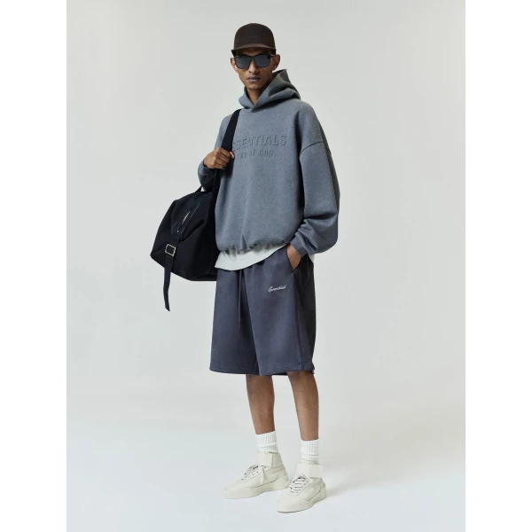 Fear of God Essentials Embossed 90s Relaxed Hoodie in Ash Heather | Sweatshirts | Coveti