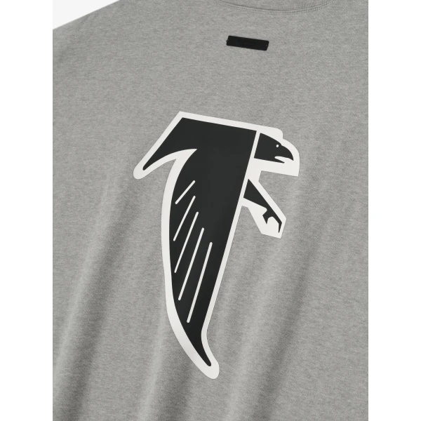 Fear of God Essentials Falcons 90s 3/4 Sleeve Football Tee in Concrete Heather | T-shirts & vests | Coveti