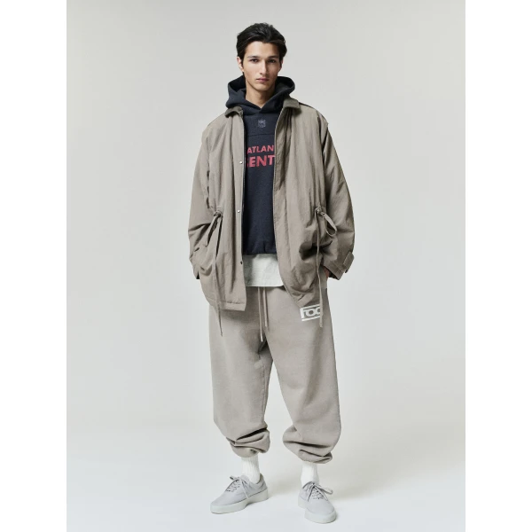 Fear of God Essentials Falcons 90s Relaxed Hoodie in Iron Grey Heather | Sweatshirts | Coveti