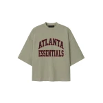 Fear of God Essentials Falcons Merch Tee in Seal Heather | Coveti