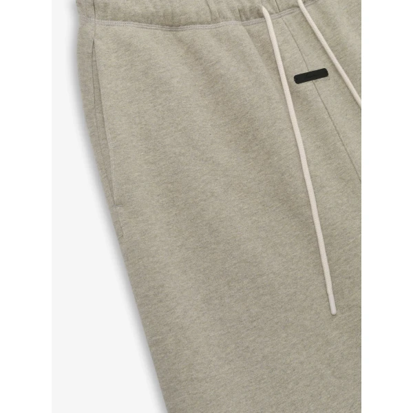 Fear of God Essentials Flare Sweatpant in Washed Seal Heather | Pants | Coveti