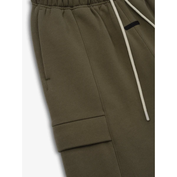 Fear of God Essentials Fleece Cargo Basketball Short in Moss | Shorts | Coveti