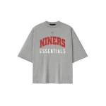 Fear of God Essentials Forty Niners 90s 3/4 Sleeve Football Tee in Concrete Heather | Coveti