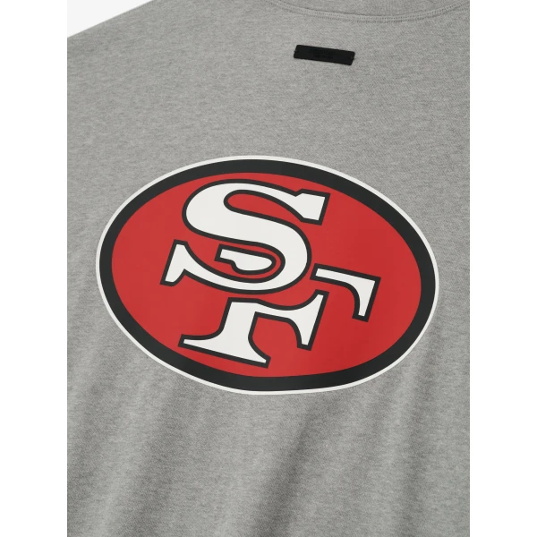 Fear of God Essentials Forty Niners 90s 3/4 Sleeve Football Tee in Concrete Heather | T-shirts & vests | Coveti