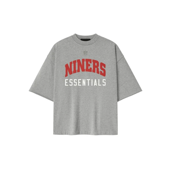 Fear of God Essentials Forty Niners 90s 3/4 Sleeve Football Tee in Concrete Heather | Coveti