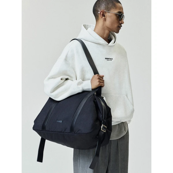 Fear of God Essentials Front Logo Classic Hoodie in Oatmeal Heather | Sweatshirts | Coveti