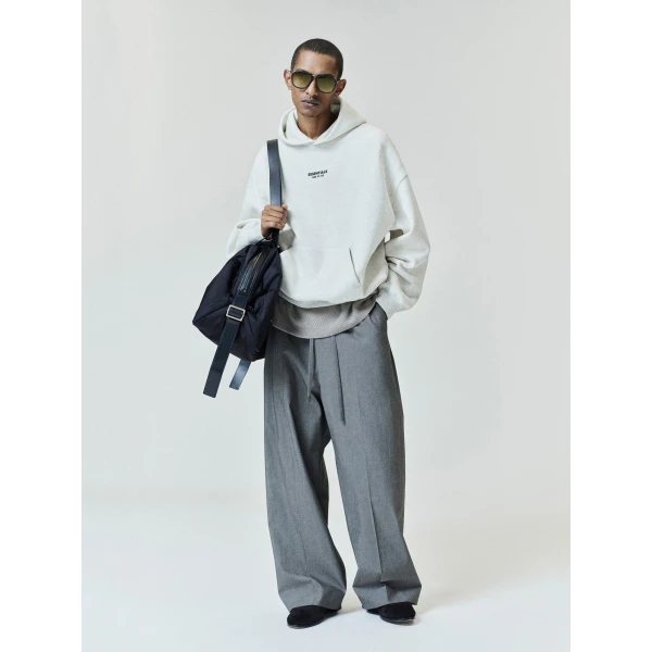 Fear of God Essentials Front Logo Classic Hoodie in Oatmeal Heather | Sweatshirts | Coveti