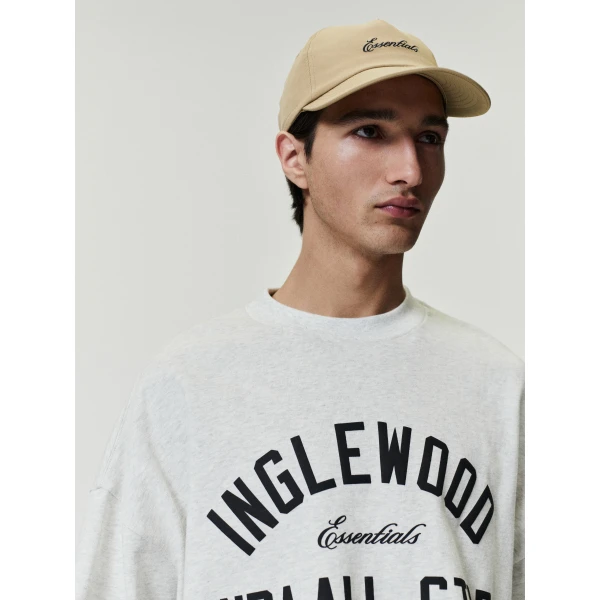 Fear of God Essentials Inglewood x All Star Weekend 2026 90s Tee in Oatmeal Heather | T-shirts & vests | Coveti