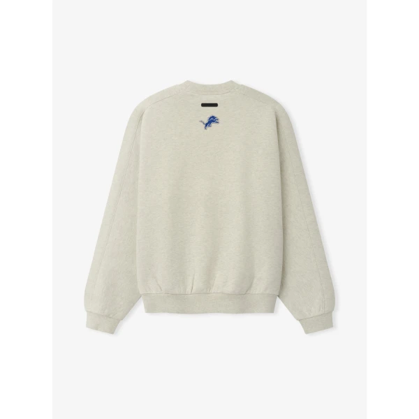 Fear of God Essentials Lions 90s Relaxed Crewneck in Marble Heather | Sweatshirts | Coveti