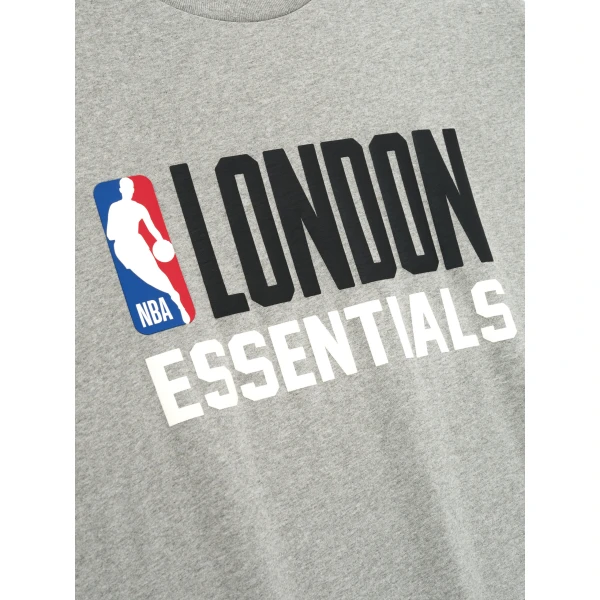 Fear of God Essentials London 90s Fit Tee in Concrete Heather | T-shirts & vests | Coveti