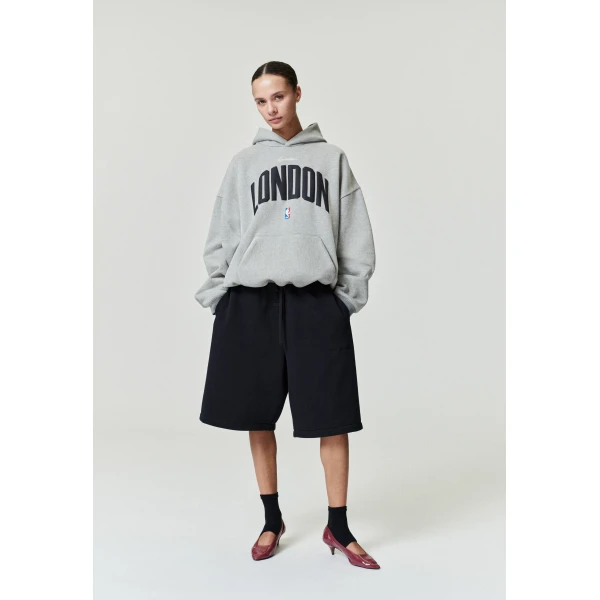 Fear of God Essentials London 90s Hoodie in Concrete Heather | Sweatshirts | Coveti