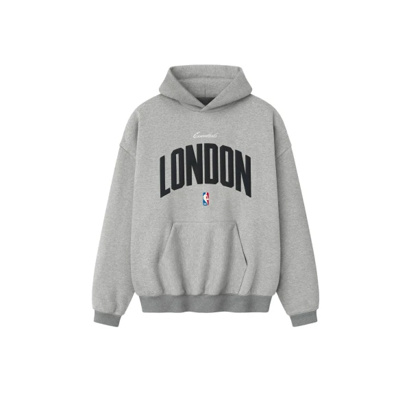 Fear of God Essentials London 90s Hoodie in Concrete Heather | Coveti