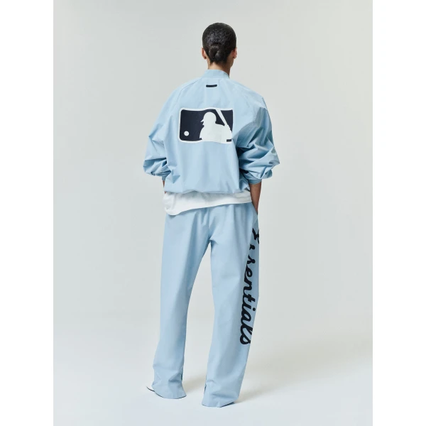 Fear of God Essentials MLB Full Zip Bomber in Stone Blue | Men Jackets | Coveti