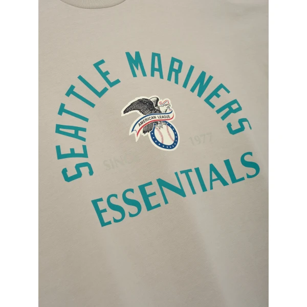 Fear of God Essentials Mariners American League Merch Tee in Seal | T-shirts & vests | Coveti