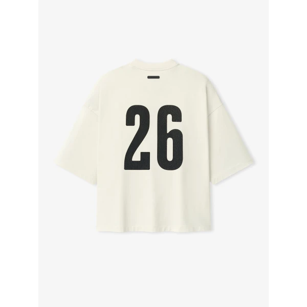 Fear of God Essentials Merch Tee Boxy Fit in Ivory | T-shirts & vests | Coveti