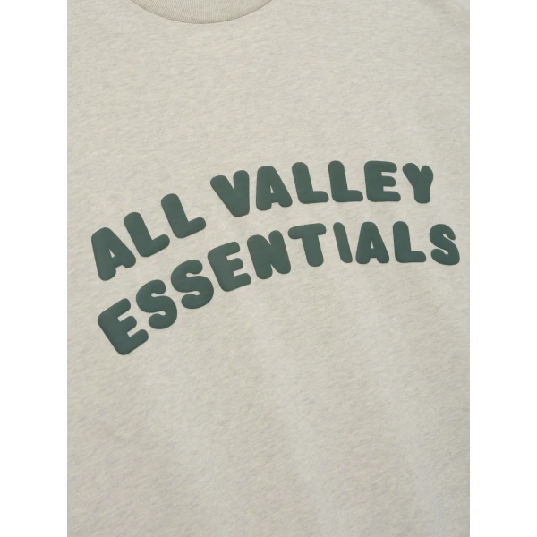 Fear of God Essentials Merch Tee Boxy Fit in Vanilla Heather | T-shirts & vests | Coveti