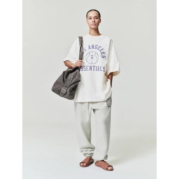 Fear of God Essentials NBA x Barkley Hendricks Classic Sweatpant in Heather Stone | Pants | Coveti