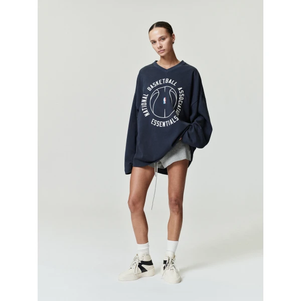 Fear of God Essentials NBA x Barkley Hendricks Long Sleeve V-Neck Tee in Faded Black | T-shirts & vests | Coveti