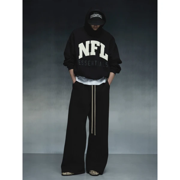 Fear of God Essentials NFL Sport Hoodie in Black | Sweatshirts | Coveti