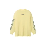 Fear of God Essentials Panelled Modern Long Sleeve Tee in Washed Sulphur | Coveti