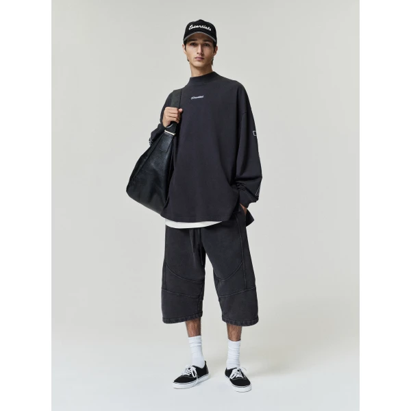 Fear of God Essentials Panelled Modern Long Sleeve Tee in Washed Vintage Black | T-shirts & vests | Coveti