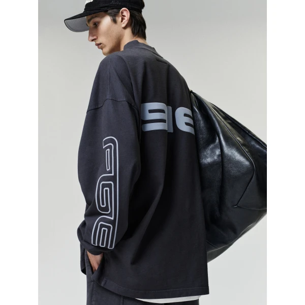 Fear of God Essentials Panelled Modern Long Sleeve Tee in Washed Vintage Black | T-shirts & vests | Coveti