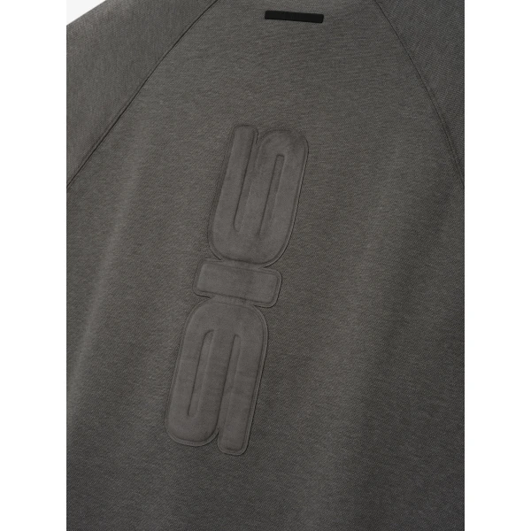 Fear of God Essentials Pique 90s Relaxed Mockneck Raglan Long Sleeve Tee in Ash Heather | T-shirts & vests | Coveti