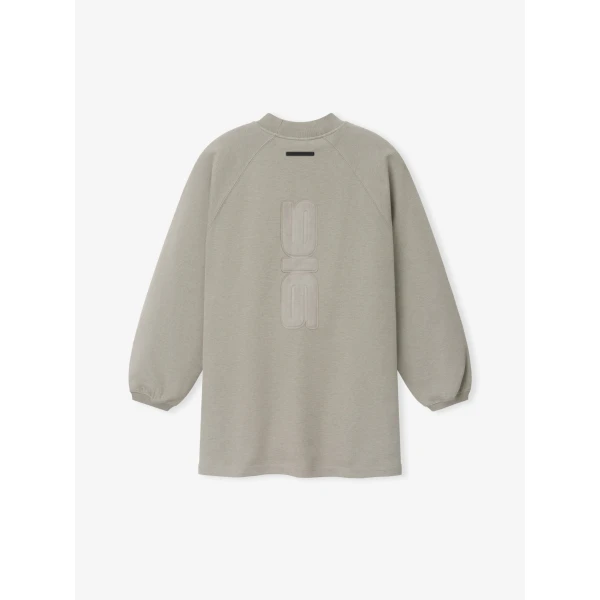 Fear of God Essentials Pique 90s Relaxed Mockneck Raglan Long Sleeve Tee in Pyrite Heather | T-shirts & vests | Coveti